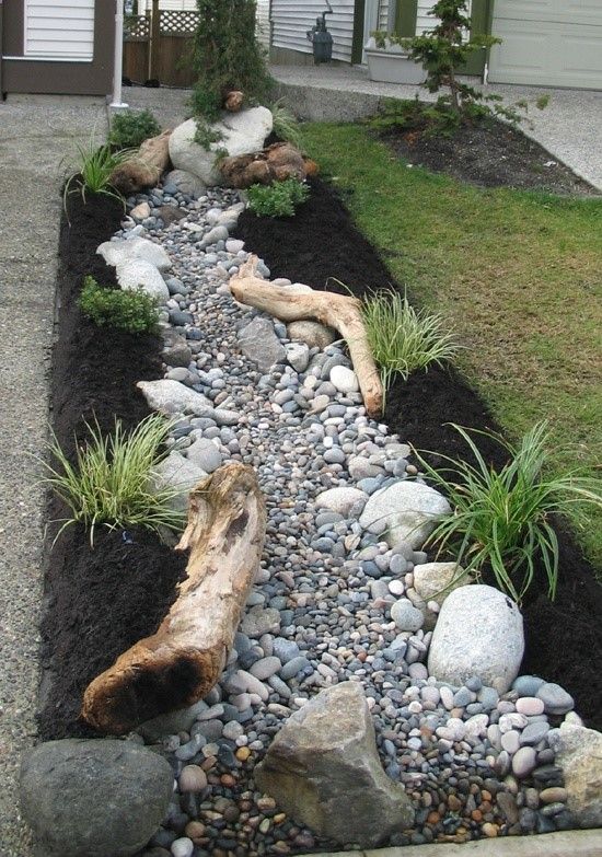 Impressive rock riverbed with wooden elements