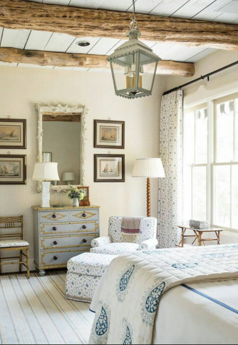 Delicate Blue and White Upholstery and Exposed Beams