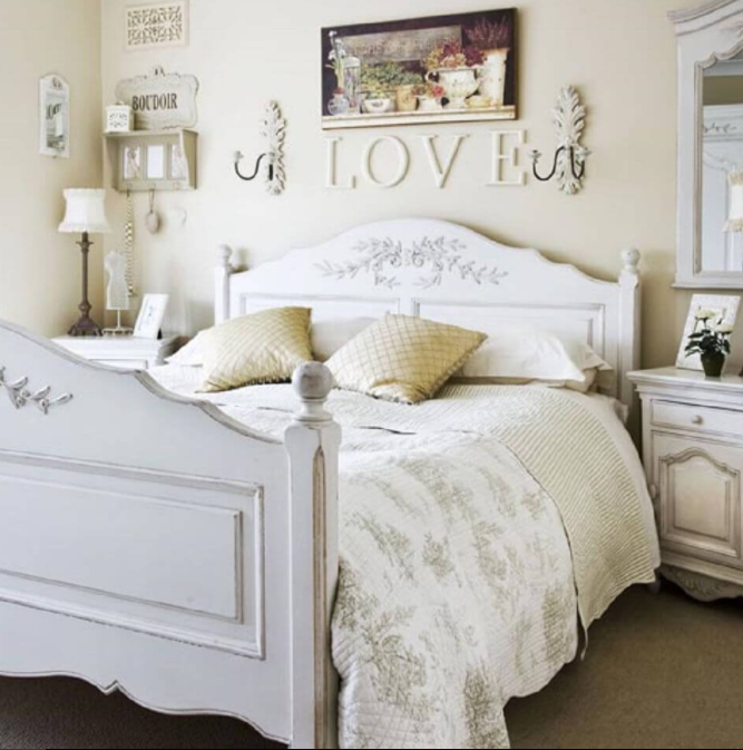White Flowered Headboard and Wooden Letters