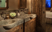 Rustic Bathroom Décor with Concrete Sinks and Barn Door
